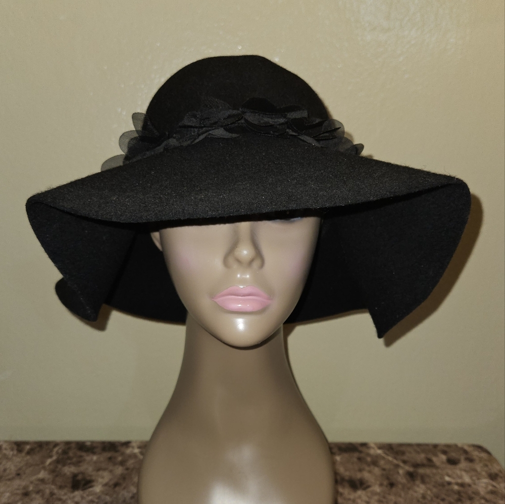Black wool hat with flowers.